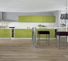 large stainless steel green kitchen